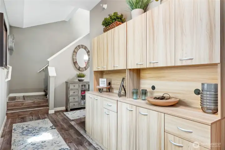 Custom storage and pantry cabinet at entry. Available for purchase Custom storage and pantry cabinet at entry. Available for purchase