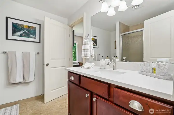 Updated Master Bath with Marble counters, custom tile floors and bath surround Updated Master Bath with Marble counters, custom tile floors and bath surround