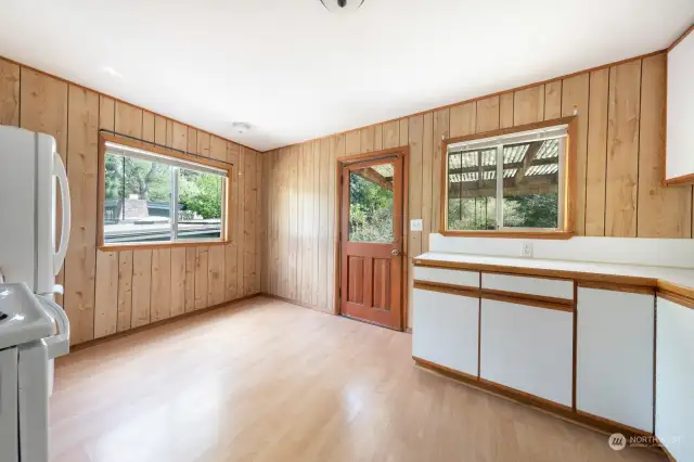 Wonderful eat-in kitchen with access to the backyard.