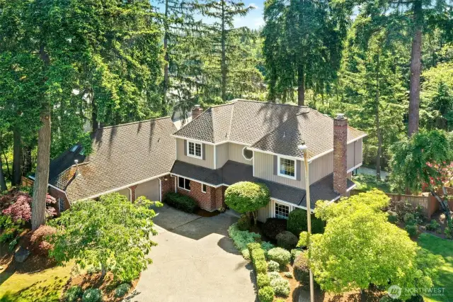 Nestled on a quiet cul-de-sac near the sought-after Tam O'Shanter neighborhood, this home boasts fantastic curb appeal