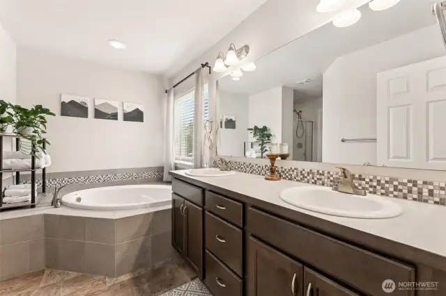 Primary ensuite bath, true 5-piece with separate shower, water closet, soaking tub and double vanity.