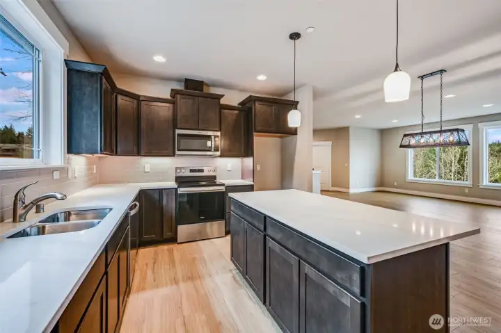 Under cabinet lighting throughout kitchen.
