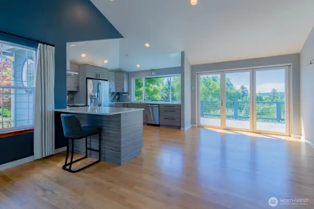 Great room upstairs with gas fireplace and views.