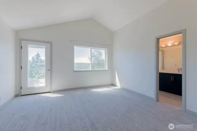 Primary bedroom with access to the deck.