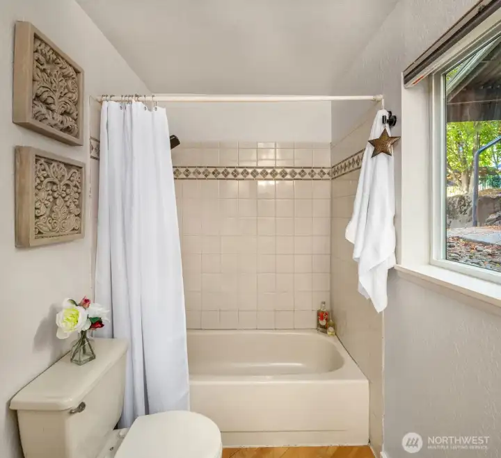 Tiled and flows with natural light.