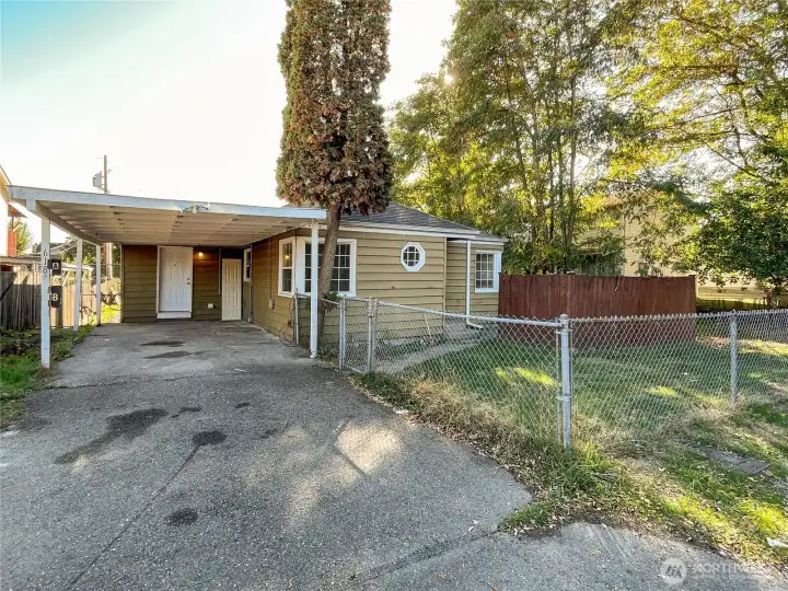 Carport and driveway parking for Unit A