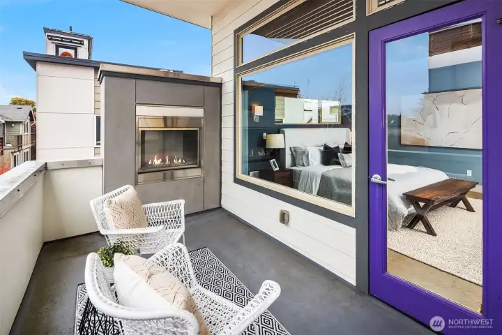 deck of primary with gas fireplace