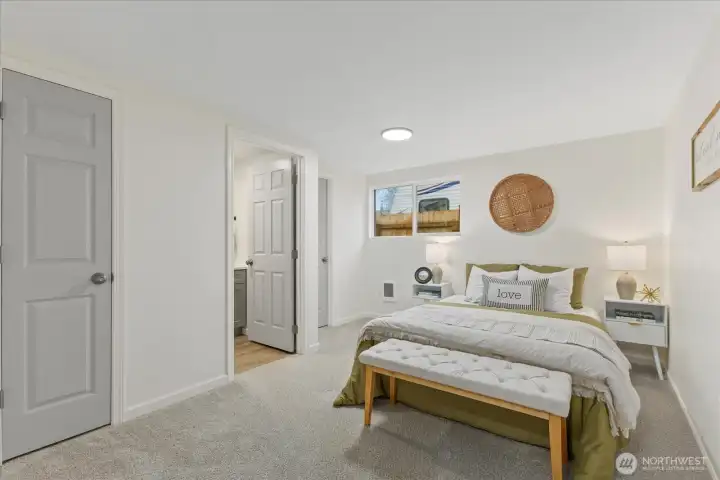 Primary bedroom with 2 closets and bath.