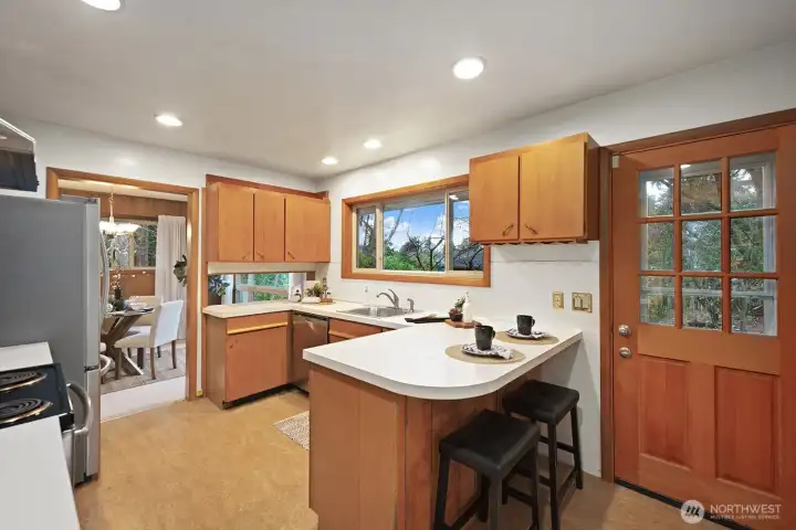 Family sized kitchen has a super functional layout.