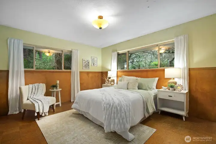 Primary bedroom easily accommodates a king size bed.