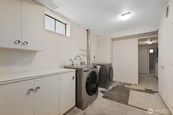 Laundry area also has potential for a 2nd kitchen.