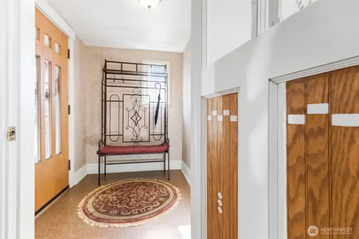 Custom door between the entryway and living room