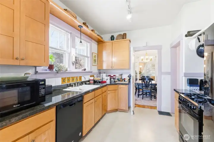 Swinging door between dining room and kitchen