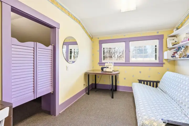 Second upstairs bedroom with saloon doors to the walk-in closet