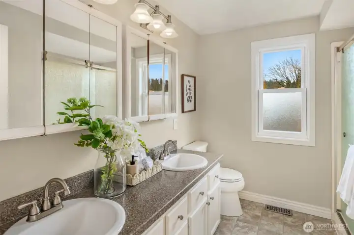 Primary bathroom offers double sinks and great countertop space!