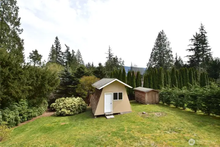 Large Outbuilding w/shelves and Tool Bench.