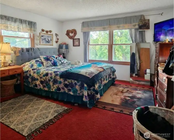 Upper Bedroom   Photo has been digitally enhanced with blinds open.