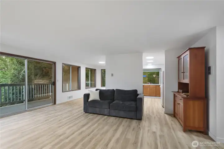 Living Room to Open Concept Dining Room on left, Kitchen on right