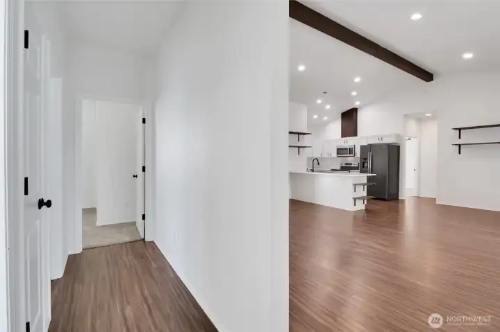 Interior hallway with access to bedrooms and main living area