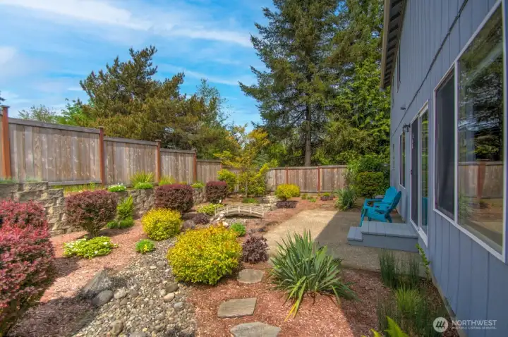 Professionally landscaped low maintenance backyard