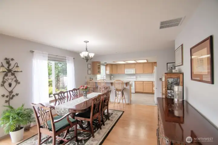 The dining room and kitchen.