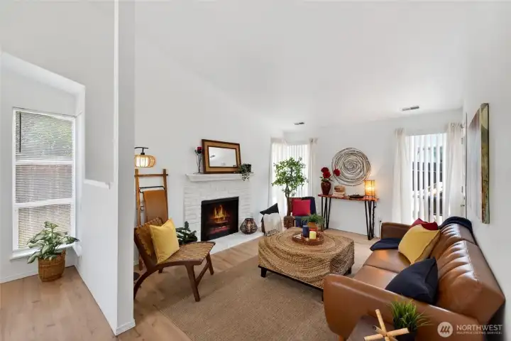 Step inside and be welcomed by soaring vaulted ceilings and an abundance of natural light.  A place you'll love coming home to everyday!