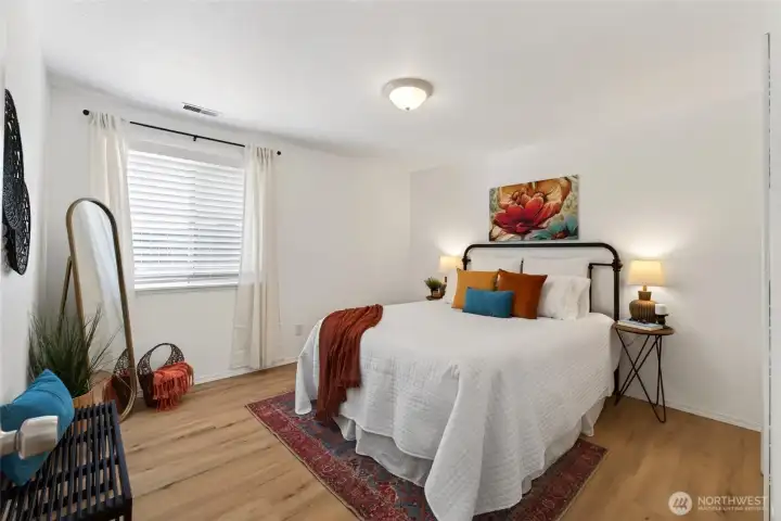 Retreat to the generously sized Primary bedroom,