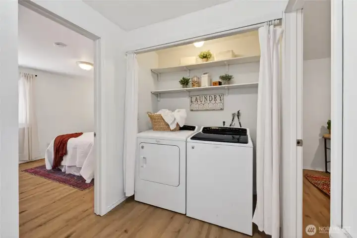 In-home laundry area, washer and dryer are included with the sale.