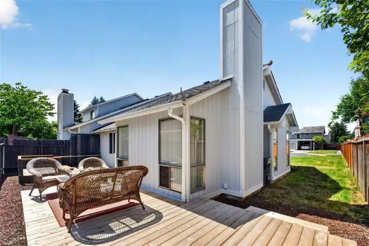 This rewly renovated deck is perfect for relaxing or entertaining in your private back yard.