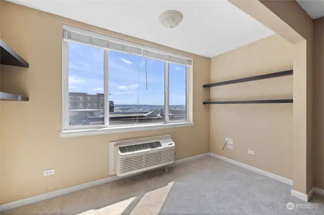 Living room looking out to the northern view and Cascade Mountains.