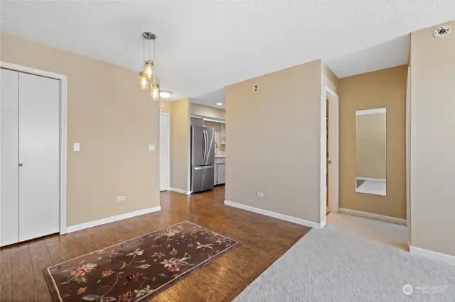 Dining area with kitchen beyond.