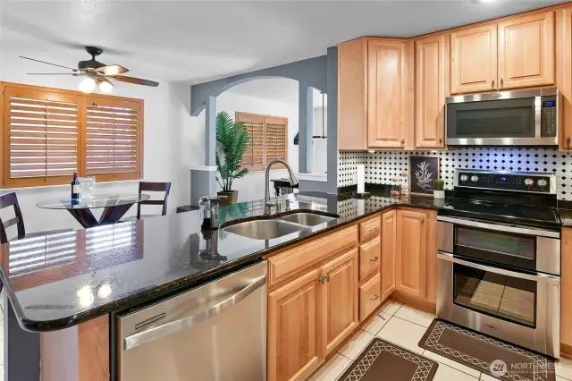 Kitchen with ample eating space. Photo taken prior to recent painting. The blue/gray is now white.