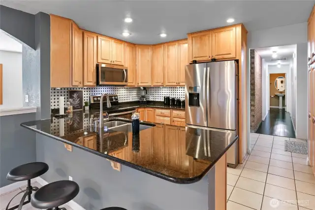 High quality cabinets feature drawers with solid dovetail construction and full sub-drawer suspensions. Photo taken prior to recent painting. The blue/gray walls are now white.