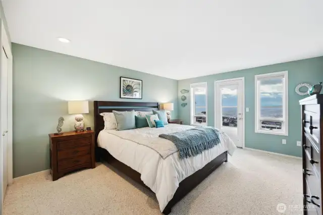 The primary bedroom has its own access to the deck, lots of closet space and its own ensuite.