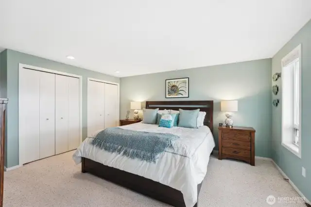 The primary bedroom has its own access to the deck, lots of closet space and its own ensuite.