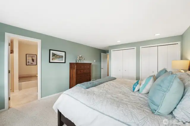 The primary bedroom has its own access to the deck, lots of closet space and its own ensuite.