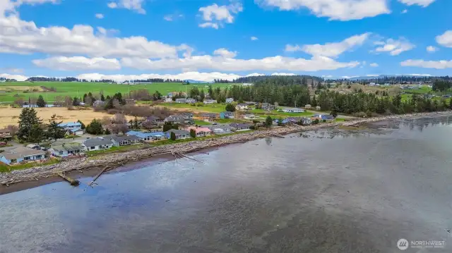 When the tide is out you can beachcomb on the flats warming in the sun.  When the tide returns, the water is warmed by the flats and its time for a swim in swimming pool temperature water!