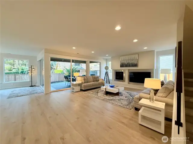View of the great room, with the outdoor room beyond.
