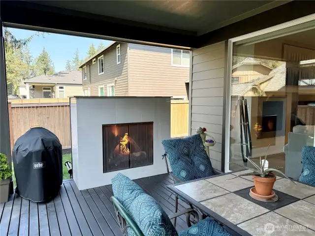 Outdoor room with cozy outdoor fireplace.