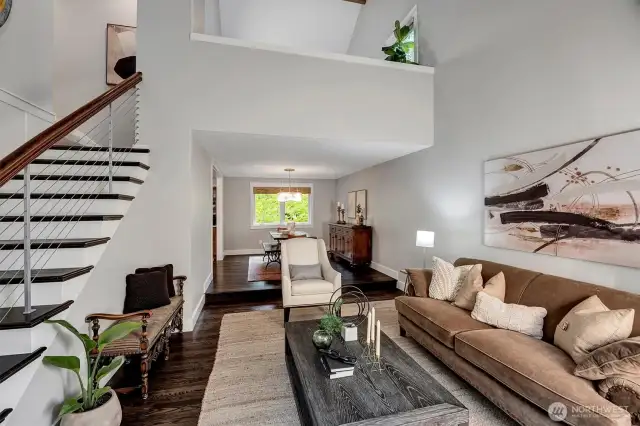 Living room with high ceilings and Loft