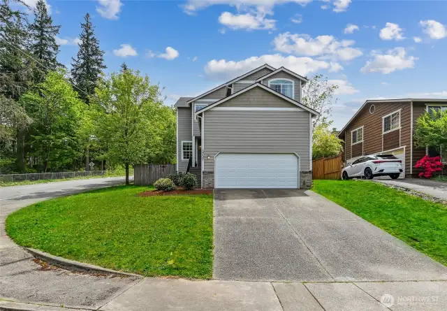 The two-car garage offers exceptional vertical clearance—rare in residential homes at this price point—making it ideal for a full-height vehicle lift and shop for a side hustle, or a creative studio space, with enough room to accommodate a fly loft, three-point lighting setups, softbox arrays, or rigging for video and podcast production. So yes—you could launch an automotive-themed YouTube channel and still park a couple of cars in there.