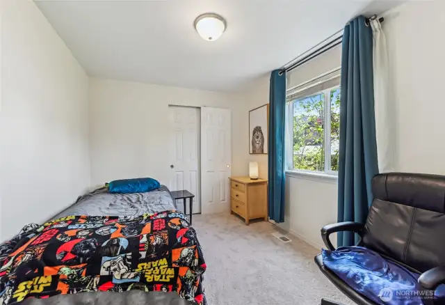 Second upstairs bedroom is spacious and move in ready.