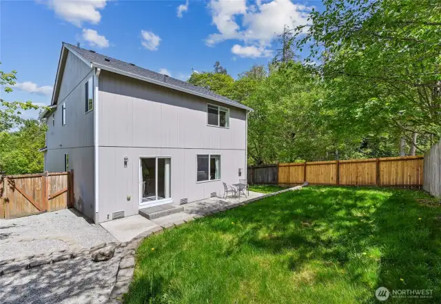 Trees surrounding the home offer privacy