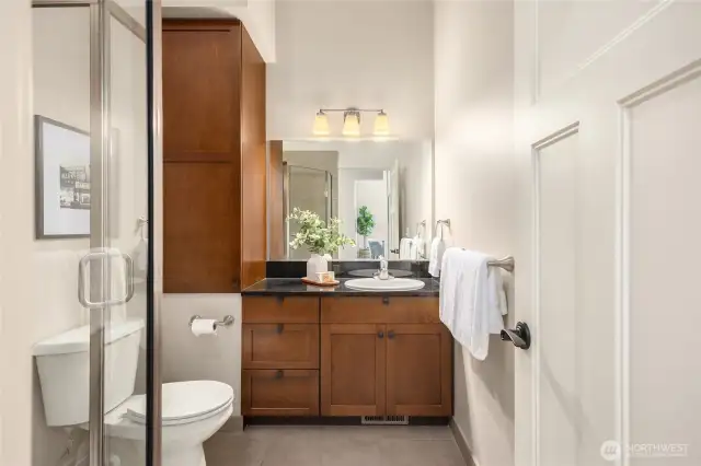 A ¾ bath on the main level creates a private guest suite or convenient setup for multigenerational living.