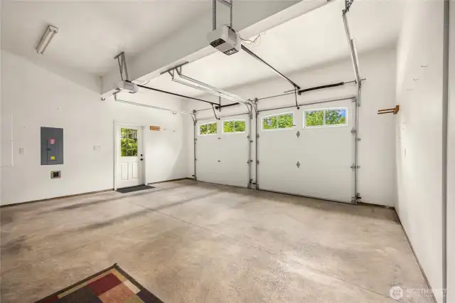 Oversized 3-car garage offers abundant parking and storage options.
