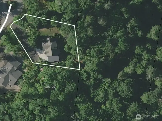 Aerial view of home and adjacent buildable lot—available together under MLS 2382673.