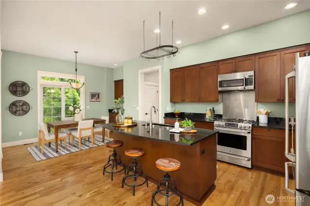 Open-concept living, dining, and kitchen spaces create effortless flow for everyday life and entertaining.