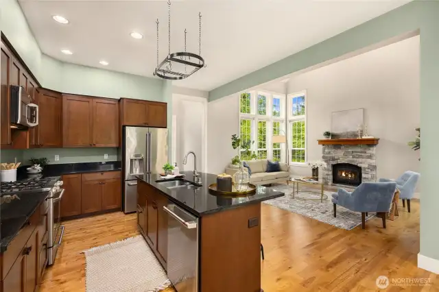Hosting is a joy with this spacious layout—connect seamlessly from kitchen to table to patio.