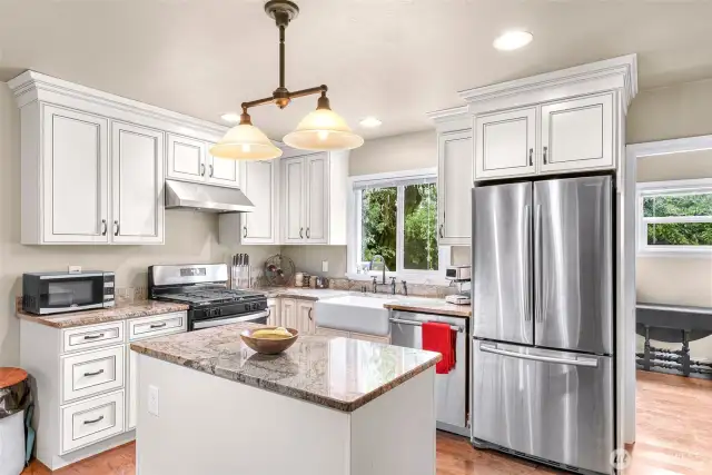in the kitchen are quality cabinets with gorgeous granite countertops