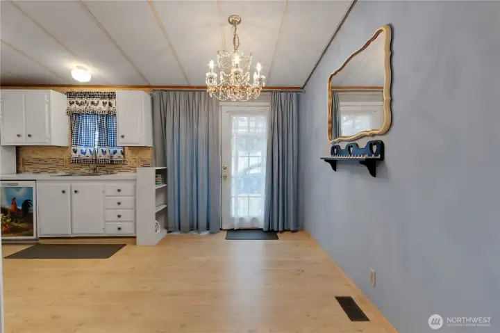 Dining area with French doors out to covered back deck